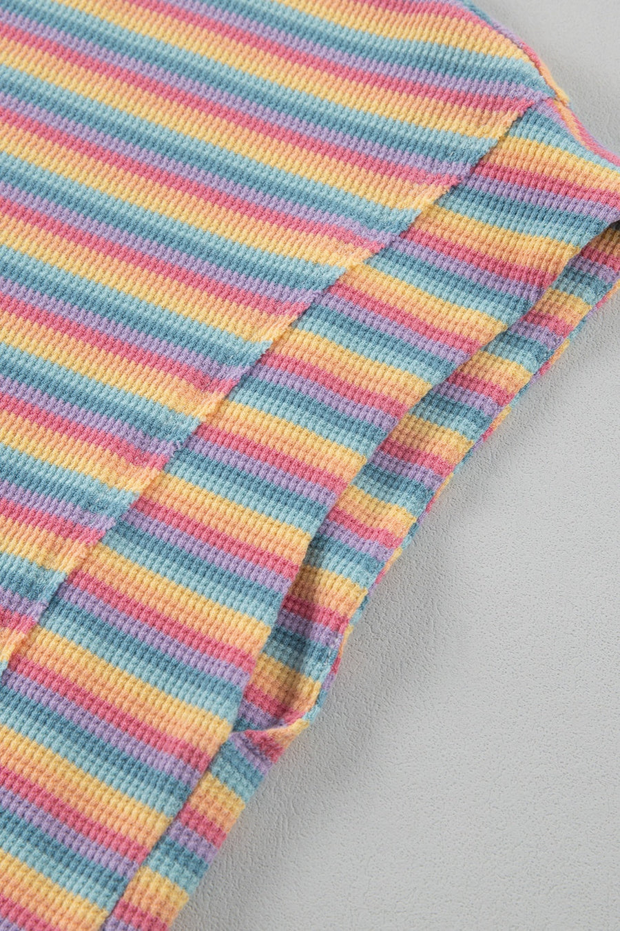 Rainbow stripe cotton lounge set detail with waffle knit texture.