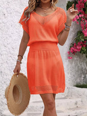 Coral perforated knit v-neck cover-up dress with smocked waist and openwork hem