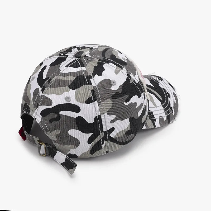 Camouflage patch baseball cap in black and white with adjustable strap.