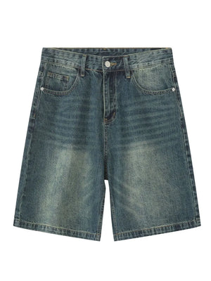 Baggy denim bermuda shorts in light blue with a washed effect and buttoned fly.