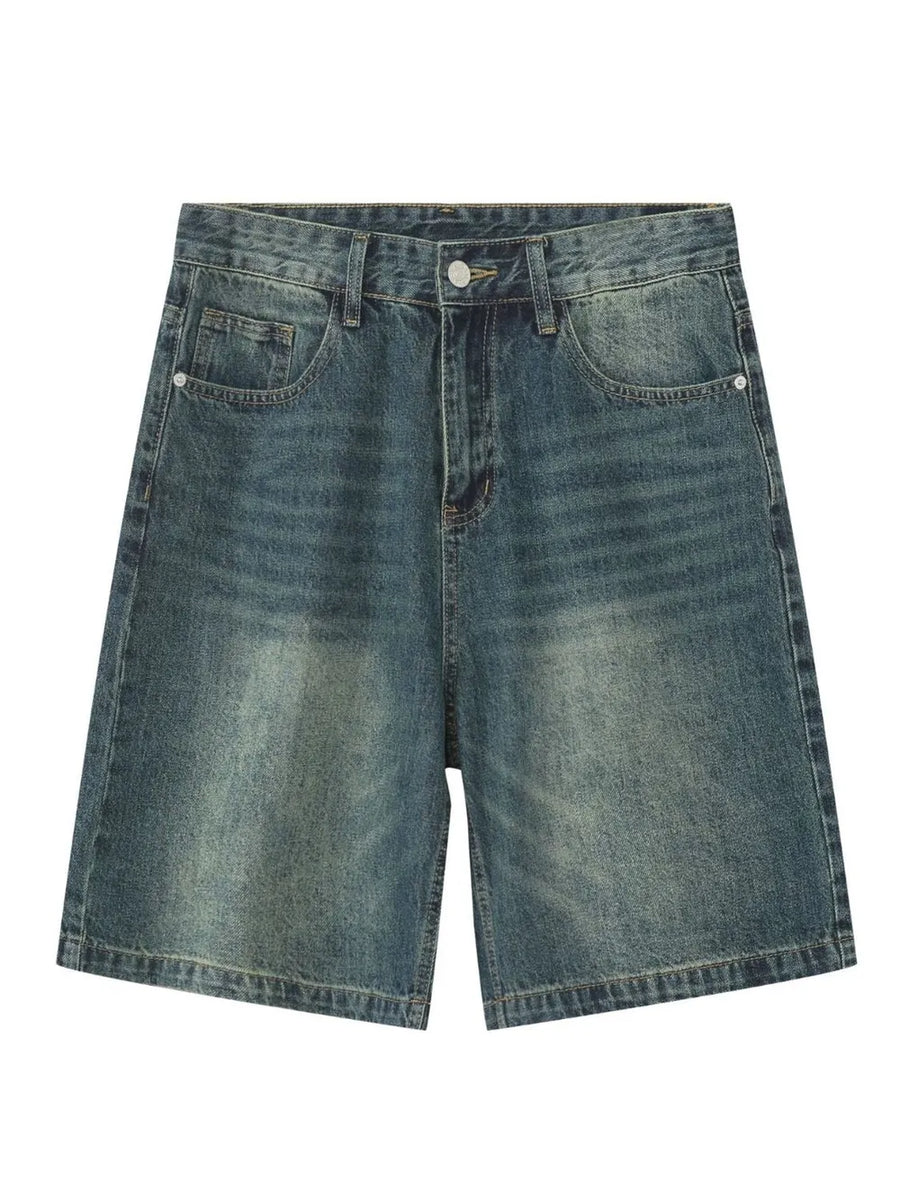 Baggy denim bermuda shorts in light blue with a washed effect and buttoned fly.