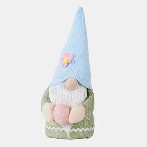 Bunny ear gnome decoration in green with pink egg and blue hat with flower.