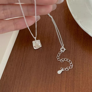 silver necklace with pendant length and NA