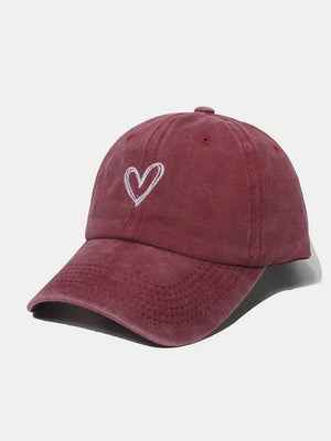 Burgundy washed cotton baseball cap with white embroidered heart detail.