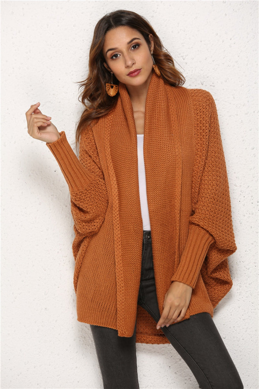 Textured cocoon knit cardigan in caramel with batwing sleeves and a shawl collar.