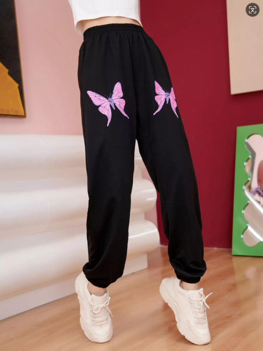 Black sweatpants with pink butterfly graphic detail