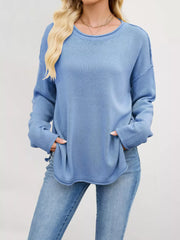 100% polyester Care instructions: Machine wash cold crewneck sweater in White with loose silhouette