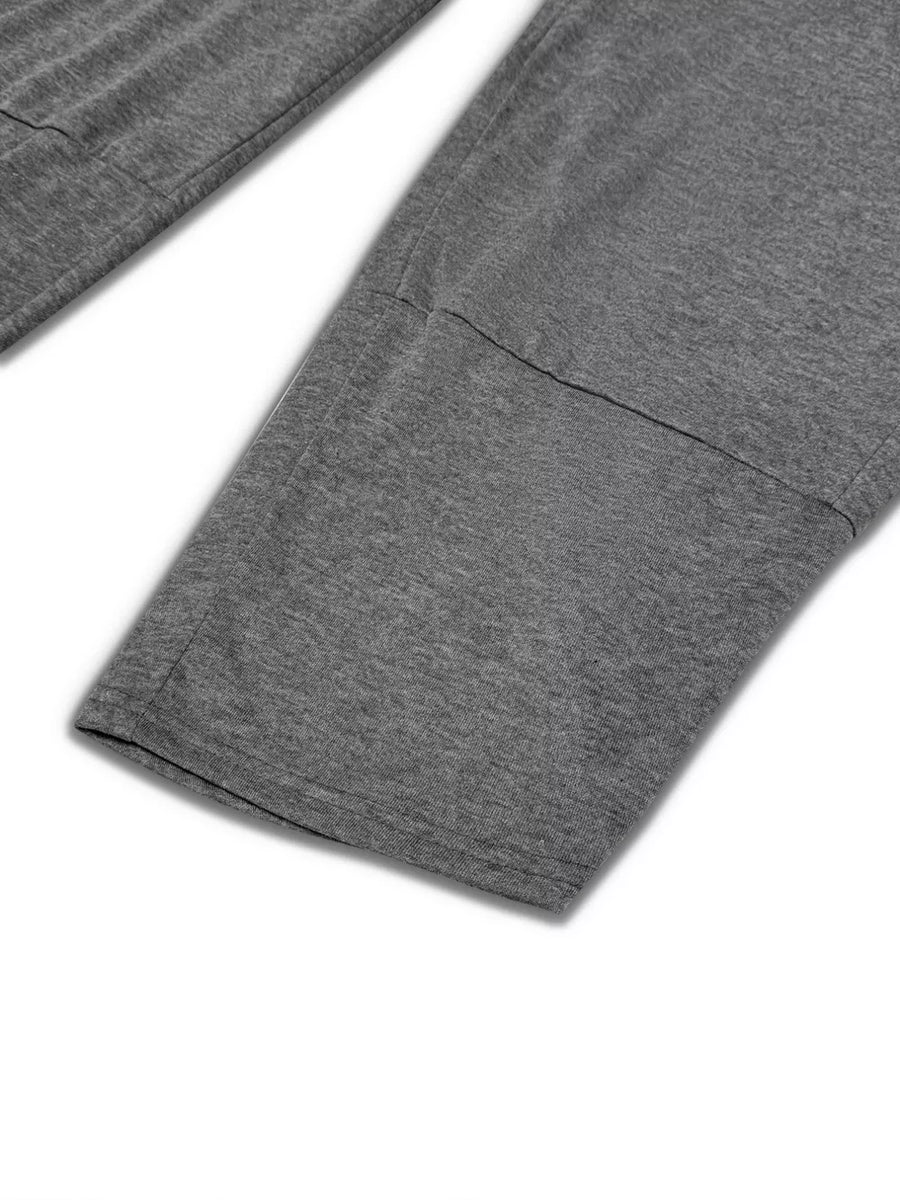 Dark gray knit lounge pants with a comfortable crew neck and detailed seam.