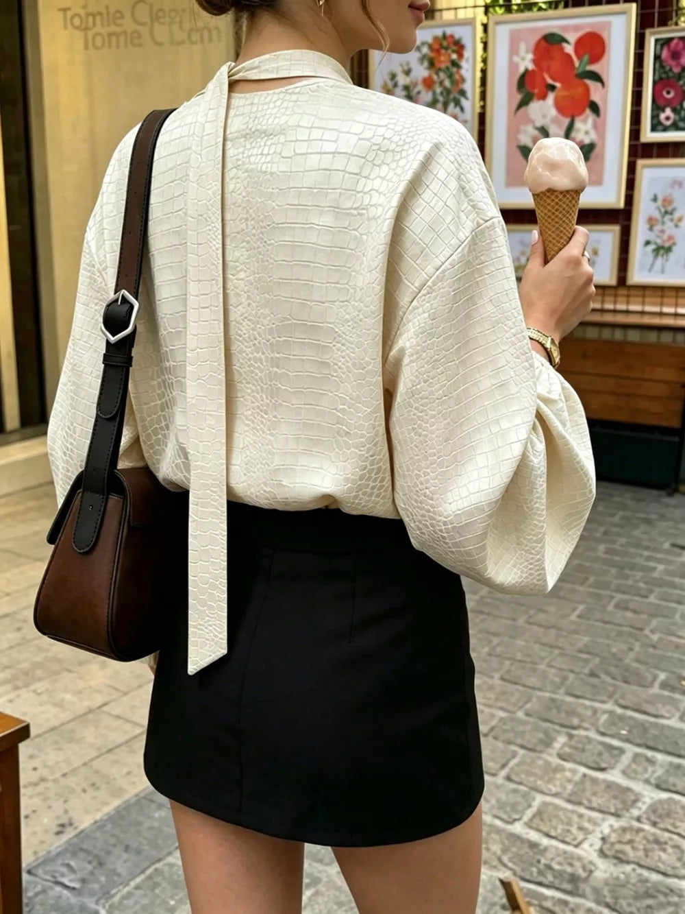 Beige blouse featuring balloon sleeve and crocodile-embossed