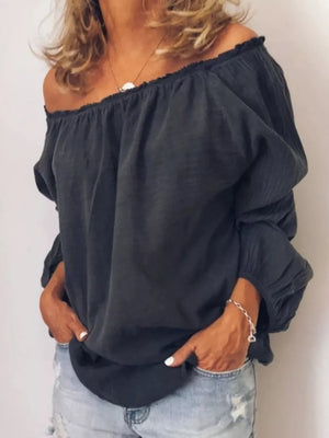 Gray off-the-shoulder maternity shirt with gathered neckline frill detail and billowy sleeves.