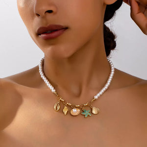 necklace in ivory featuring charm details and straight fit