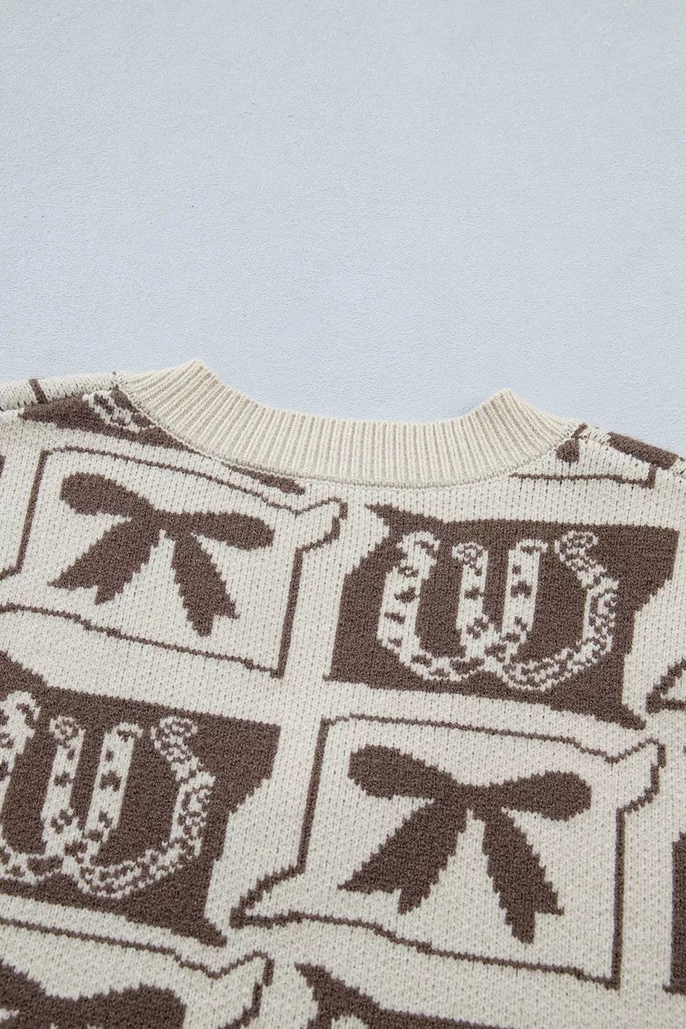 brown sweater vest with pullover and Western Horseshoe Bow Pattern
