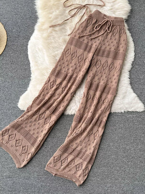 Khaki crochet wide-leg pants with diamond pattern and drawstring waist.