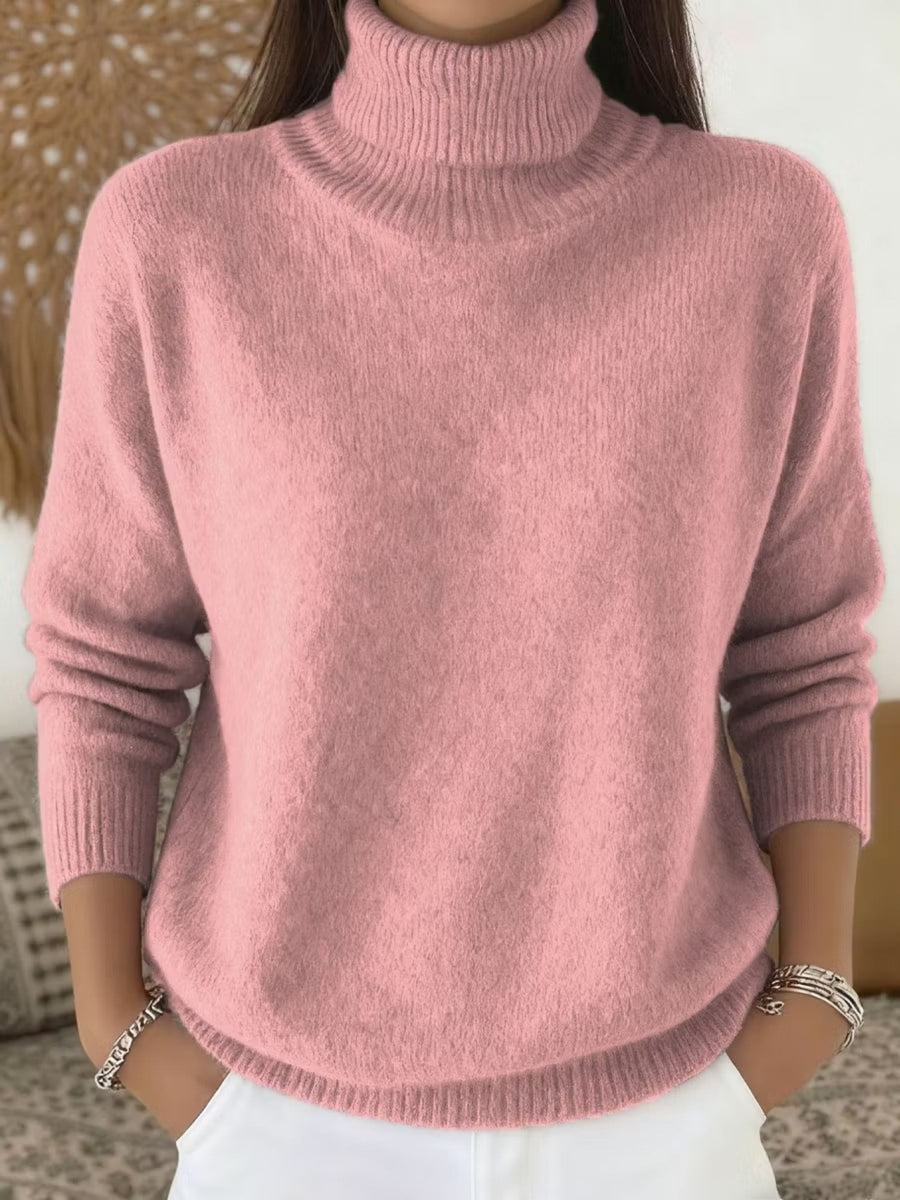 100% polyester Care instructions: Machine wash cold turtleneck sweater in White with relaxed silhouette