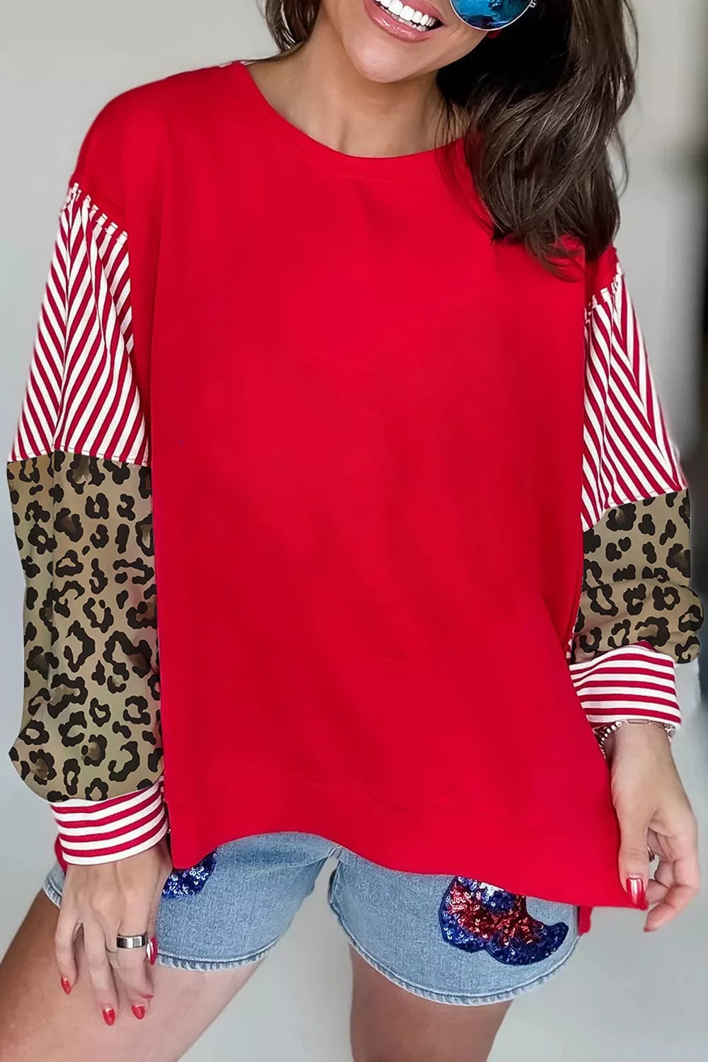 red sweatshirt with patchwork and crew neck