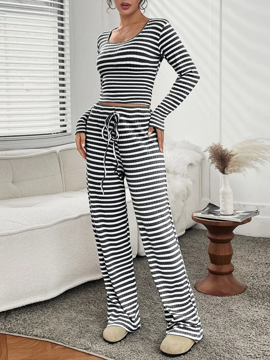 Black striped lounge set with drawstring pants and long sleeve top