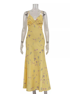 Yellow floral print slip dress with spaghetti straps and V-neckline