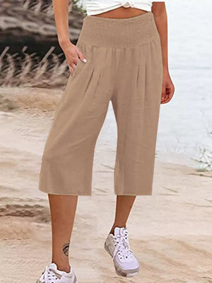 Tan linen blend cropped pants with smocked waist and pockets
