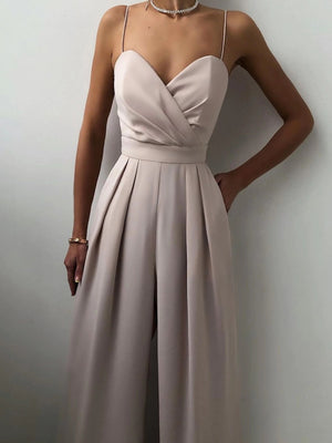 Ruched spaghetti strap wide-leg jumpsuit in Lotus Root with a sweetheart neckline and pleated wide legs.