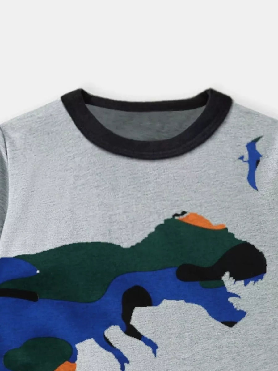 Grey t-shirt with a colorful dinosaur graphic and black ringer neck.