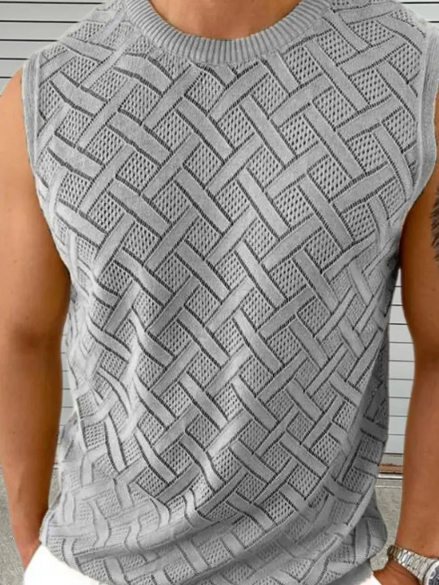 Gray geometric knit sleeveless sweater with a crew neck and open weave pattern.