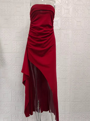 Burgundy strapless maxi dress with ruching and a high slit.