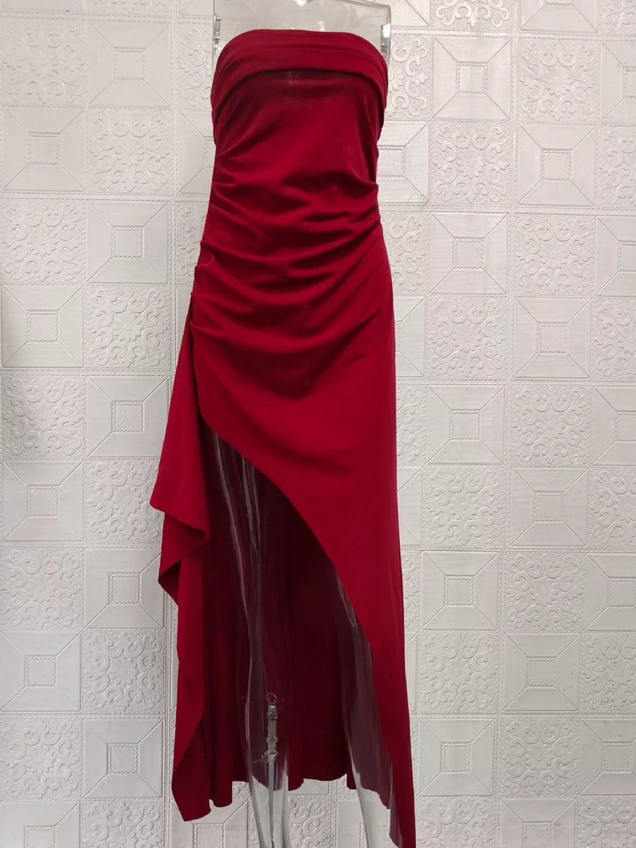 Burgundy strapless maxi dress with ruching and a high slit.