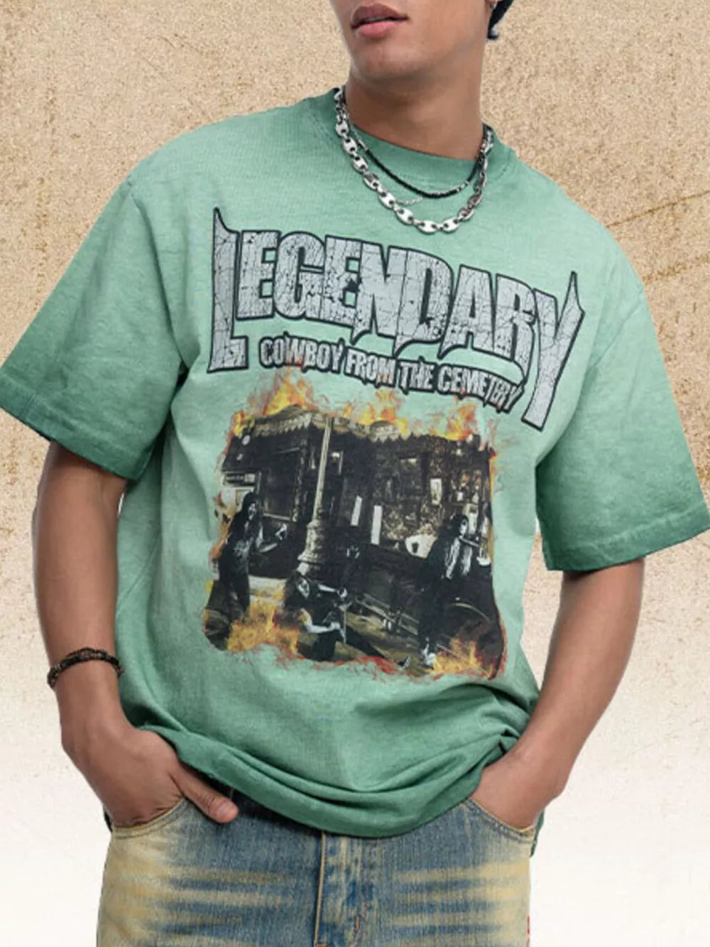 Green cotton blend t-shirt with bold cowboy graphic and distressed lettering.