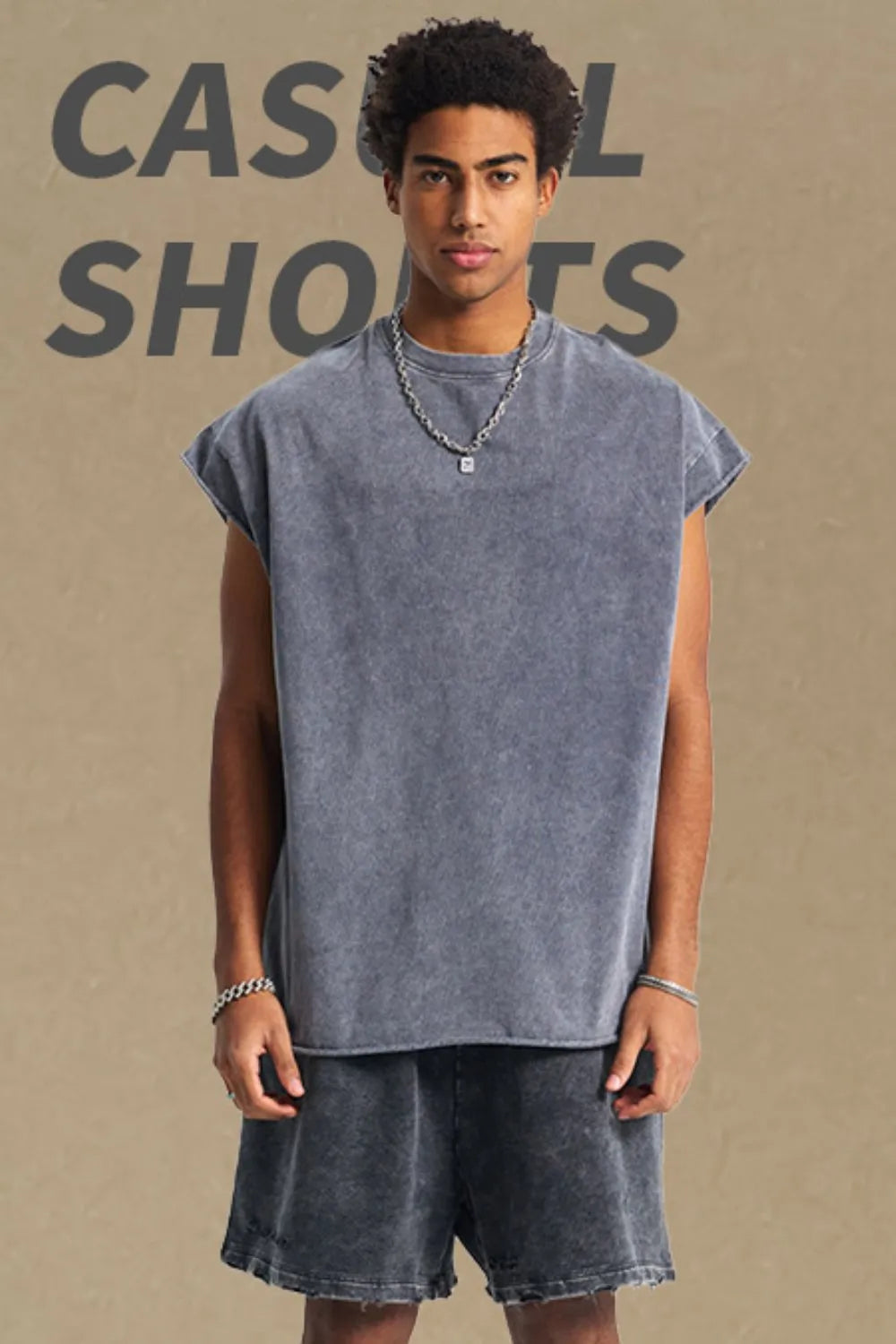 Gray acid wash boxy muscle tee with raw hem and crew neck.