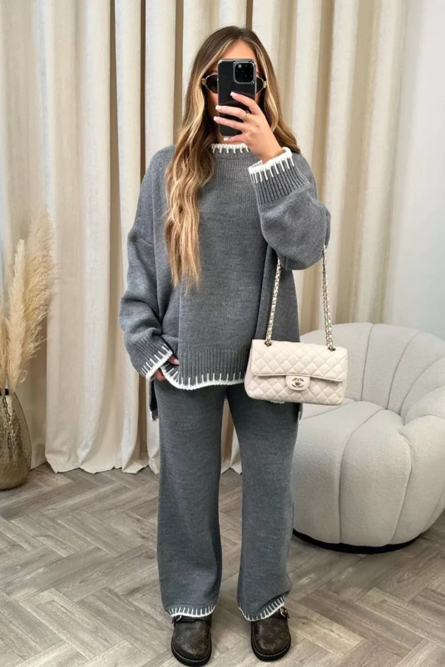 Gray relaxed fit sweater set with contrast trim details on neckline, cuffs, and hem.