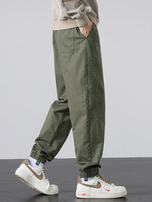 95%polyester,5%spandex Care instructions: Machine wash cold joggers in Army Green with loose silhouette