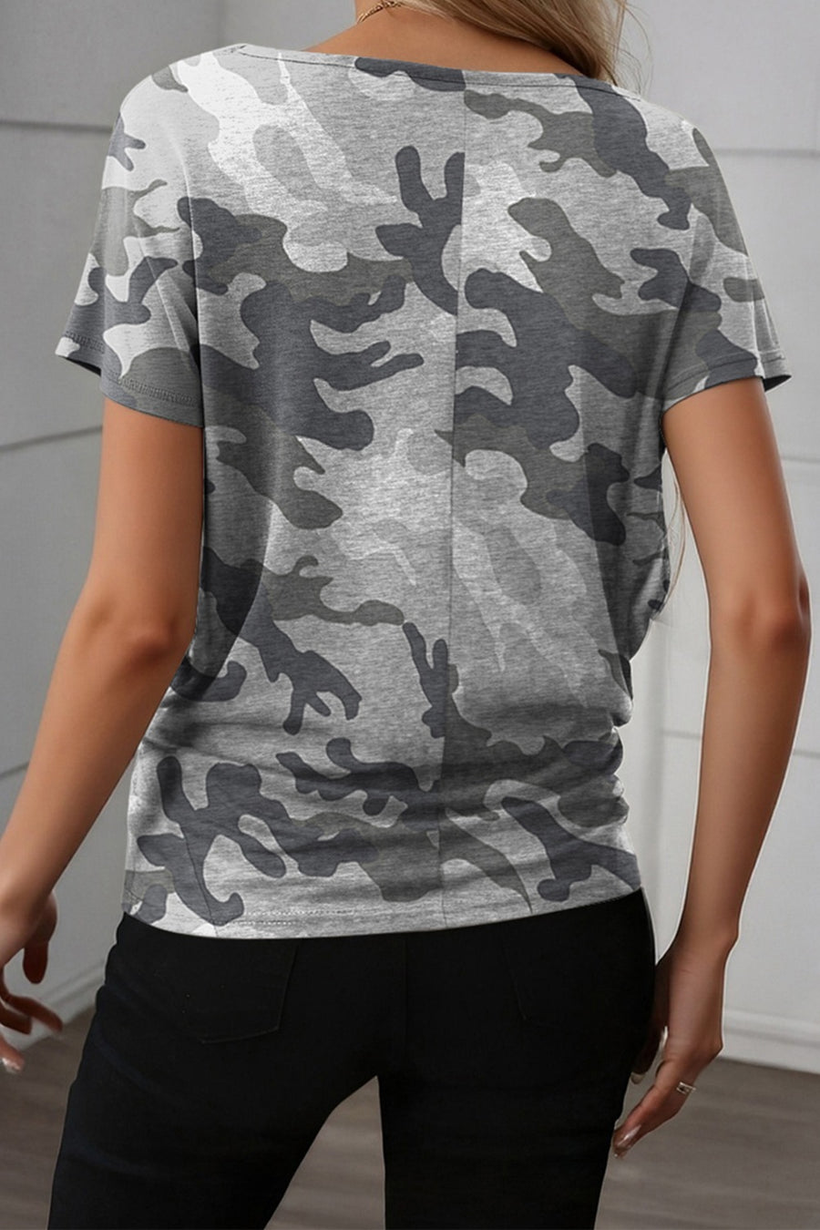 Grey camouflage crew neck t-shirt with short sleeves.