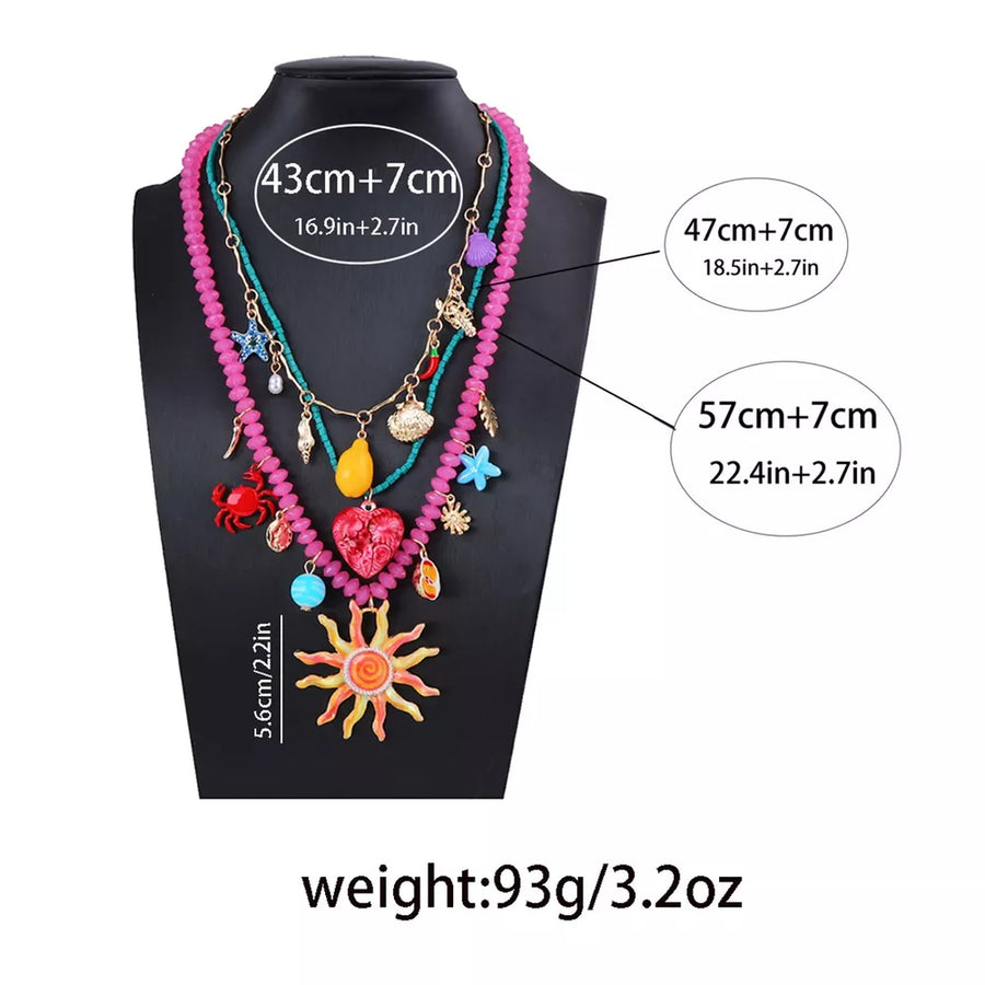 necklace in teal with charm and 3-piece set