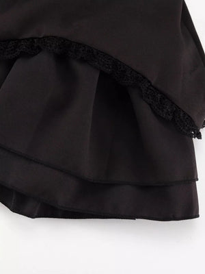 Black tiered skirt with lace trim detail