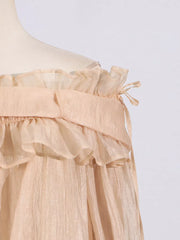 Romantic off-shoulder ruffled blouse in champagne color with tie detail