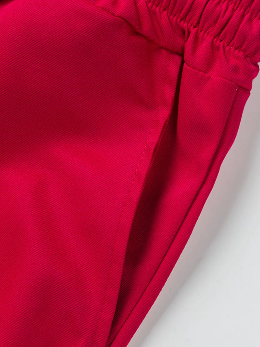 Deep red cargo shorts with elastic waistband and pocket detail.