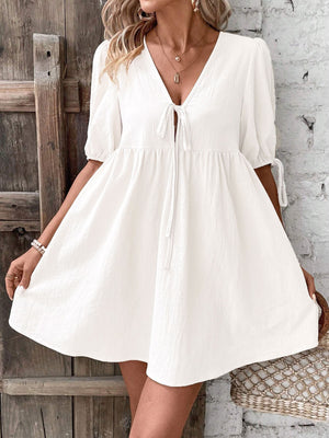 White tie front puff sleeve mini dress with adjustable sleeve ties