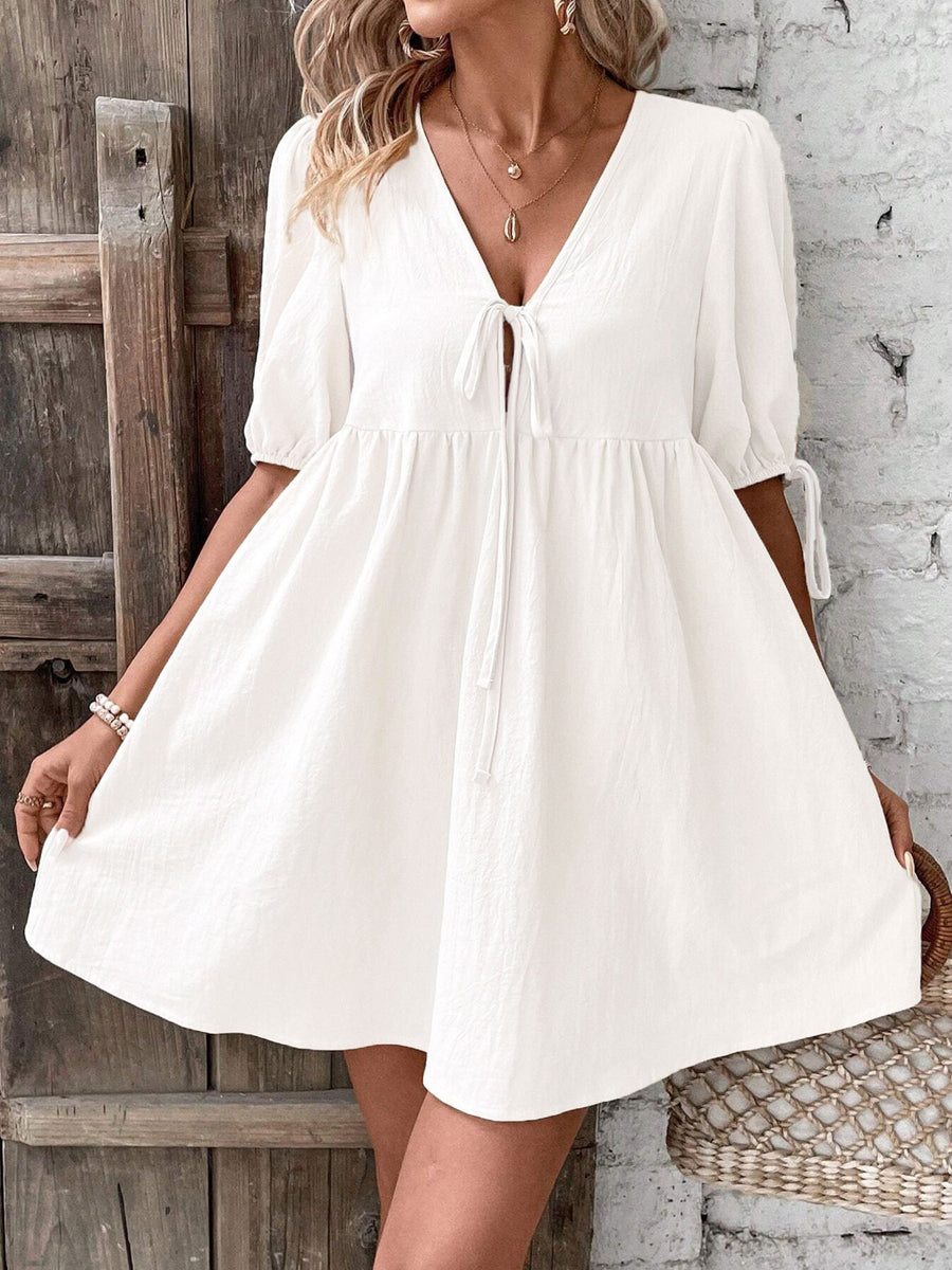 White tie front puff sleeve mini dress with adjustable sleeve ties