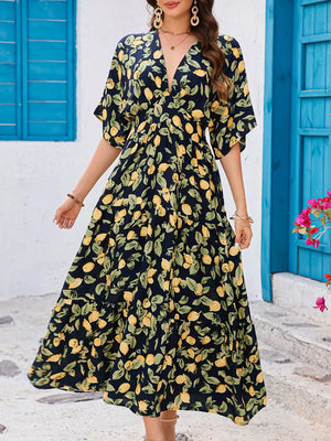 Lemon leaf print midi dress in black forest with V-neck and flutter sleeves.
