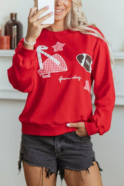 red sweatshirt with hip-length and pullover