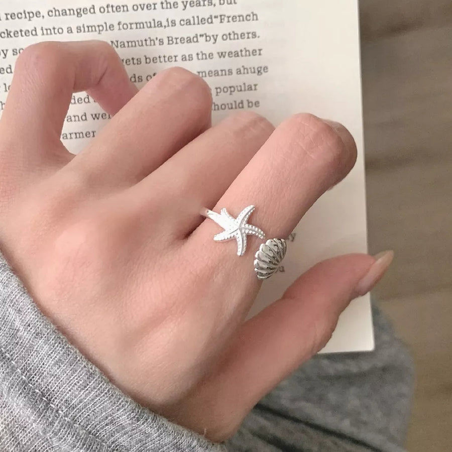 ring in Silver with starfish and seashell motif and open ring