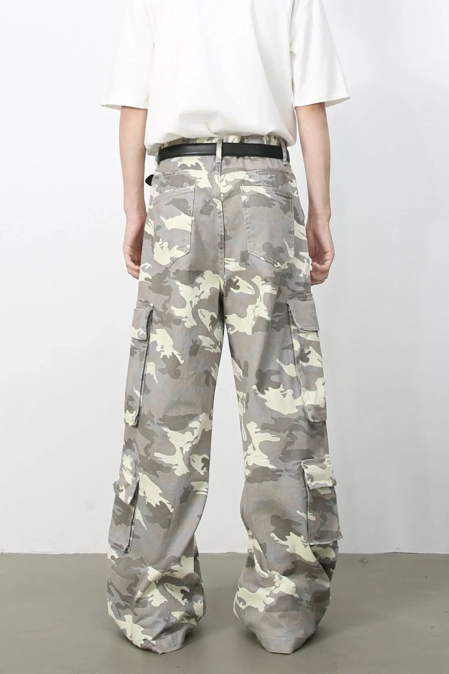 Urban Warrior cargo jeans in gray camouflage print with multiple pockets and a relaxed fit.