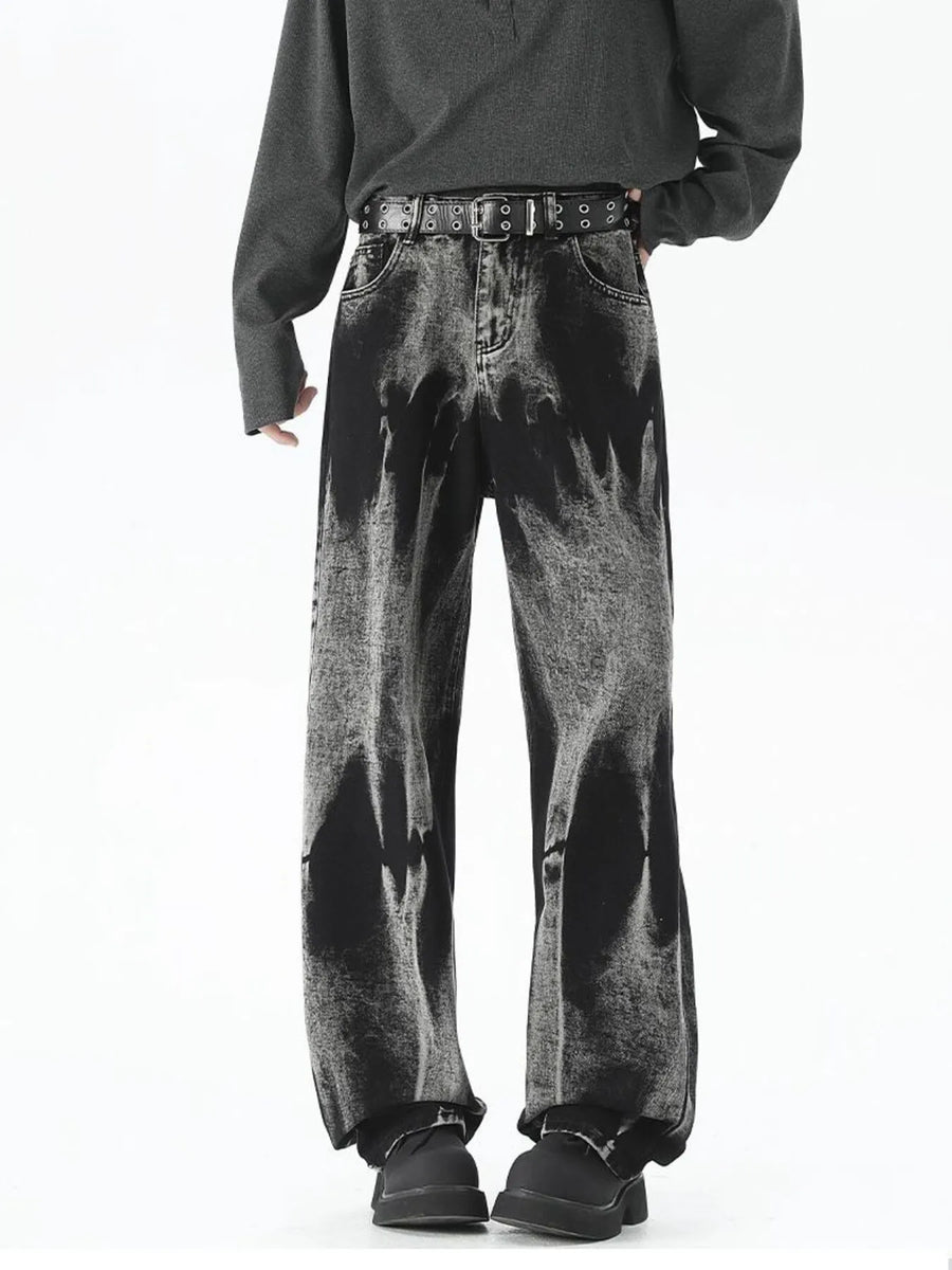 Men's black relaxed fit jeans with acid wash detail and belted waist