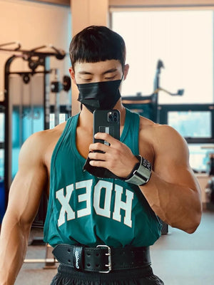 Deep Teal athletic tank top with white letter graphic and crew neck.