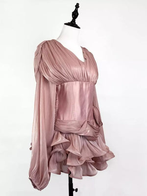 Pink ruffled mini dress with corset waist and draped detail