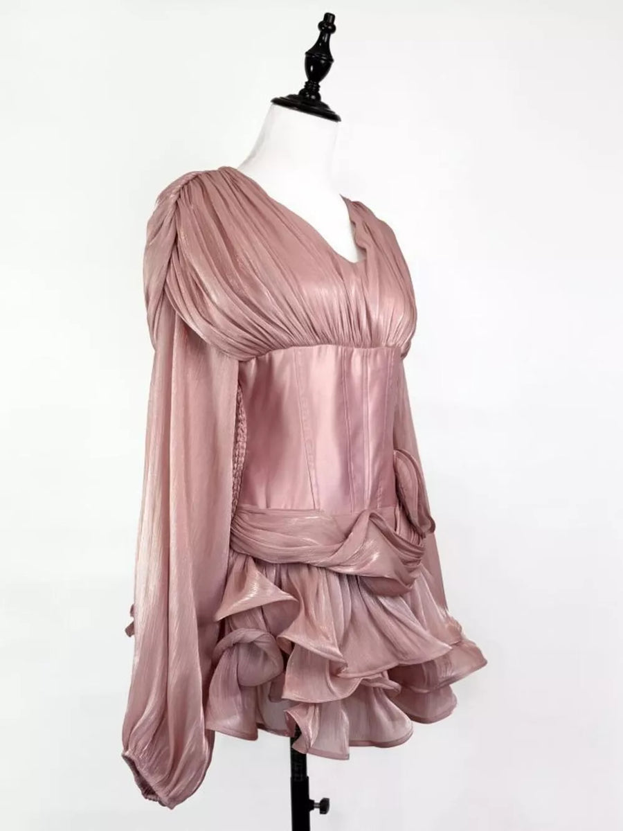 Pink ruffled mini dress with corset waist and draped detail