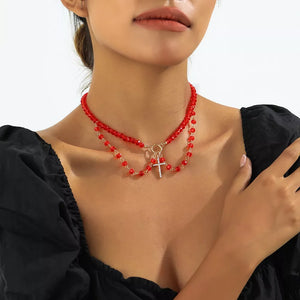 silver necklace featuring beaded and beaded