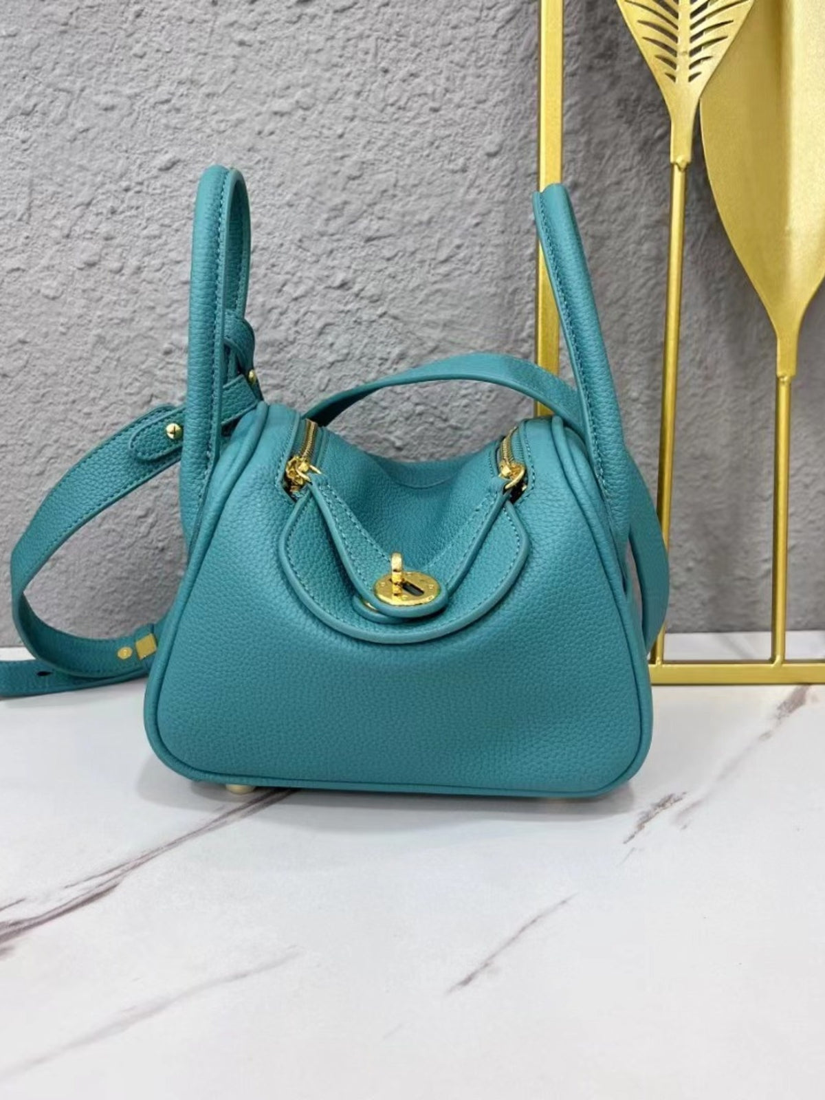 Gold-Tone Hardware Leather Crossbody Bag in teal with gold-tone hardware