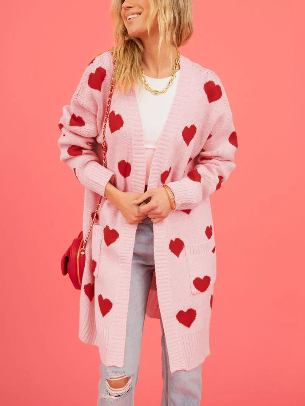 cherry red cardigan featuring ribbed and heart-print
