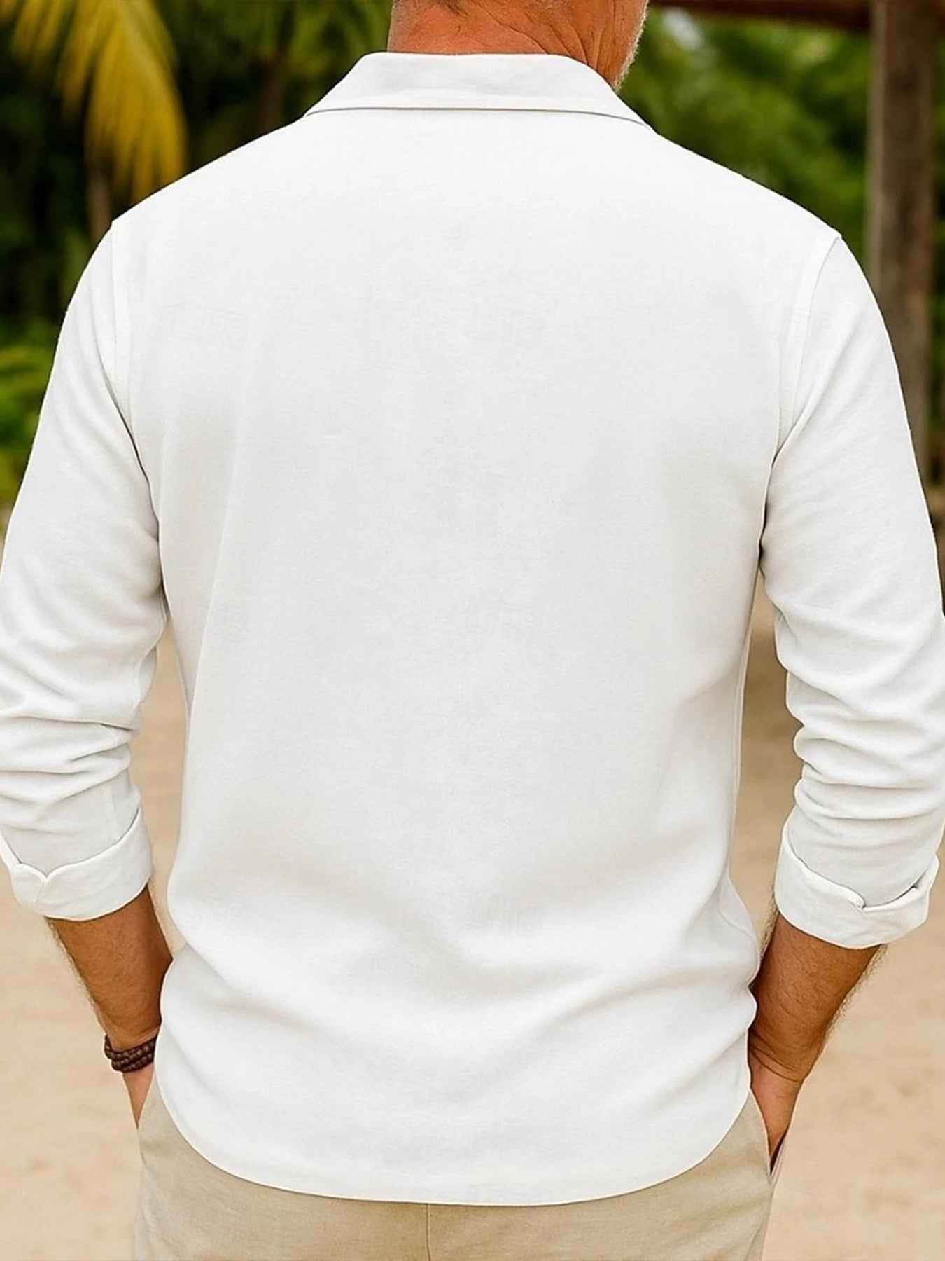 Men's white long sleeve button-up shirt, cotton blend, casual fit.